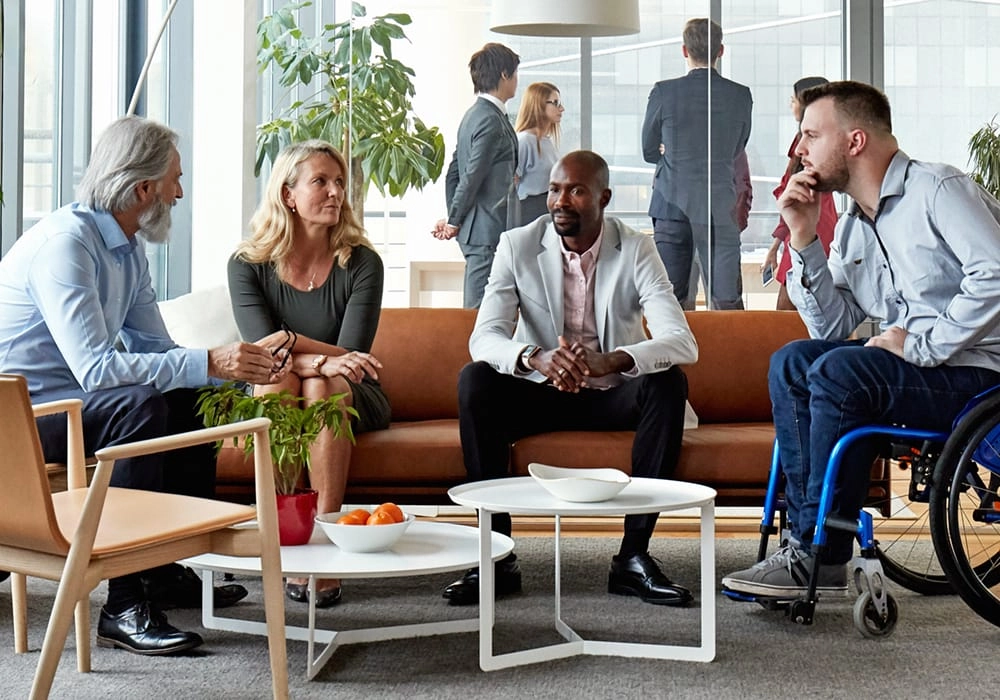 Diverse Executive Team Meeting in Office Reception Room